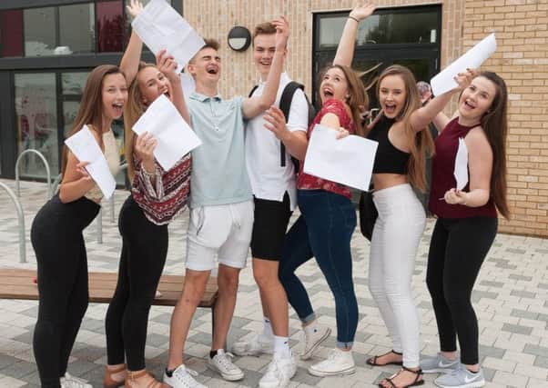 Pupils at Park Community School collect their results 
Picture: Keith Woodland (161233-6027) 161233