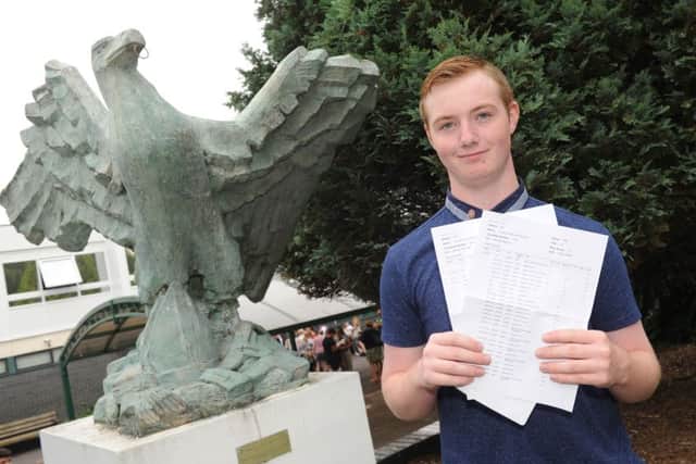 Joshua Scullion, 16, who got an A*, two As, five Bs, two Cs and a D at St Edmund's 

Picture: Sarah Standing (161134-5470)