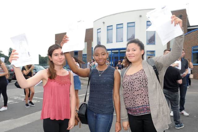 From left, Amber Knowlton, Britney Henry and TaomÃ© Rees-Dottin with their results at Cams Hill School. 

Picture: Sarah Standing (161135-5515)