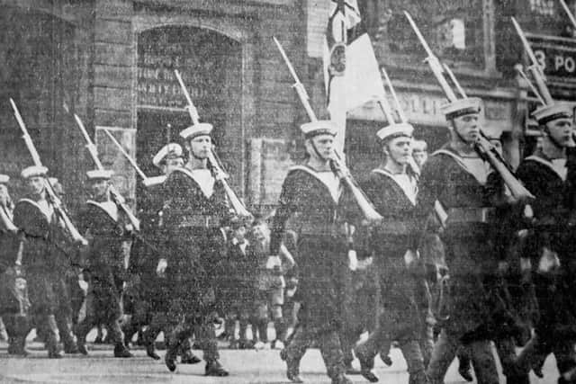 In 1939,  the Kings Colour was marched through Portsmouth from HMS Excellent, Whale Island, to the  Royal Naval Barracks, Queen Street.