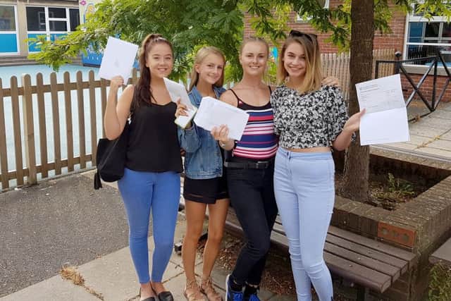 Lola Baldry, from North End, Charlotte Elford, from North End, Courtney-Leigh Hardyman, from North End, Ellie Chambers, from North End, all 16,  picking up GCSE results at Mayfield School in North End. PPP-160825-164128001