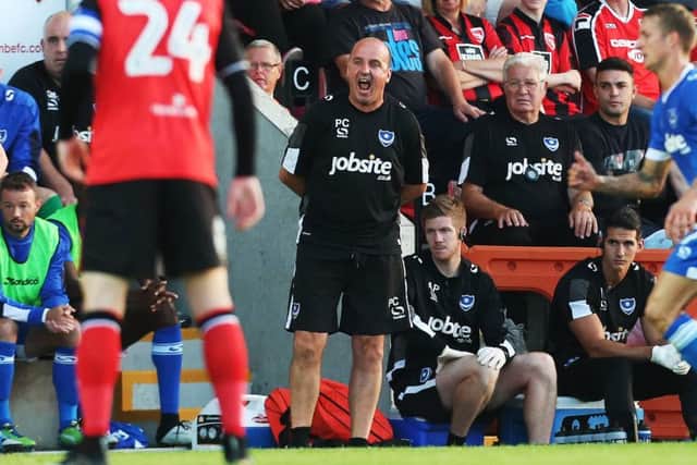 Paul Cook on the touchline at the Globe Arena Picture: Joe Pepler