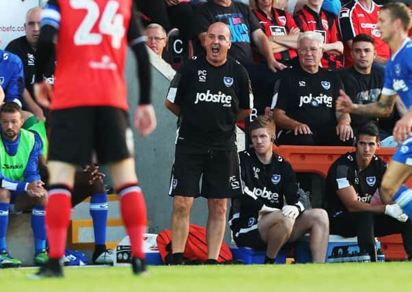 Paul Cook on the touchline at the Globe Arena Picture: Joe Pepler