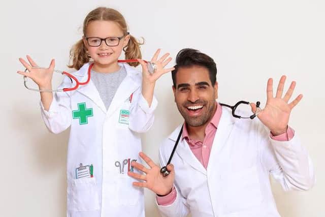 Izzy Herridge with Dr Ranj Singh  Picture: Oliver Dixon/Imagewise