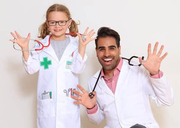 Izzy Herridge with Dr Ranj Singh Picture: Oliver Dixon/Imagewise