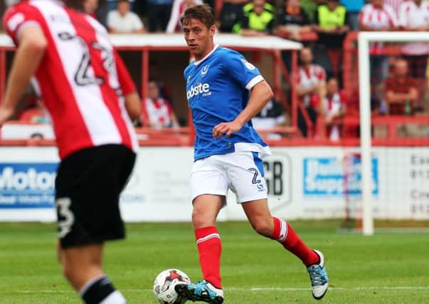 Tom Davies impressed on his league debut for Pompey at Exeter. Picture: Joe Pepler