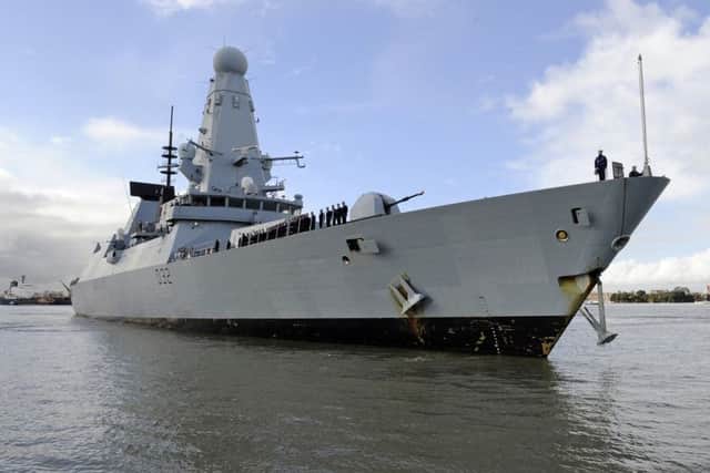 HMS Daring, pictured in Portsmouth Naval Base, is deploying to the Gulf