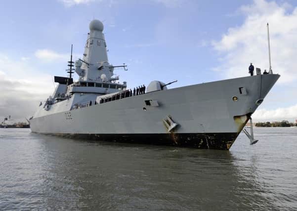 HMS Daring, pictured in Portsmouth Naval Base, is deploying to the Gulf