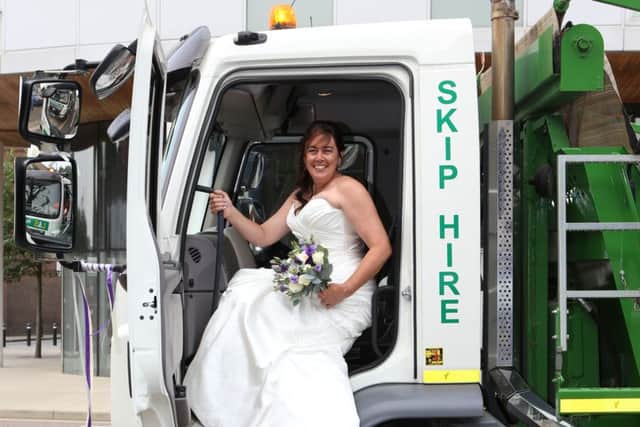 JOB 2 :
Sheila Gillies, drives a skip for L&S Waste Management. Sheila turns up at her wedding venue in the Skip Truck that she drives at Royal Maritime Club, Queen Street, Portsea, Portsmouth.
Pictured Sheila with the Skip Trucks she works with outside the venue.
Photo by Habibur Rahman
28/8/16 PPP-160828-194109001