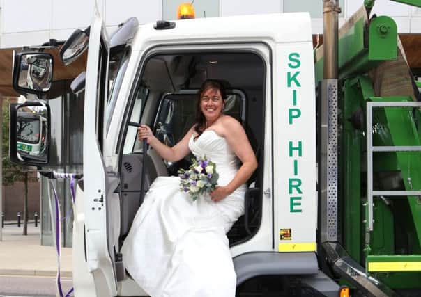 JOB 2 : 

Sheila Gillies, drives a skip for L&S Waste Management. Sheila turns up at her wedding venue in the Skip Truck that she drives at Royal Maritime Club, Queen Street, Portsea, Portsmouth.
Pictured Sheila with the Skip Trucks she works with outside the venue.
Photo by Habibur Rahman

28/8/16 PPP-160828-194109001