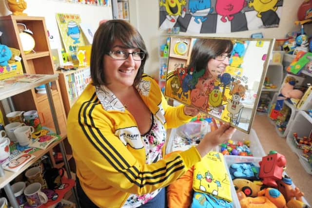Michelle Harrop with her collection of Mr Men memorabilia