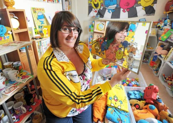 Michelle Harrop with her collection of Mr Men memorabilia