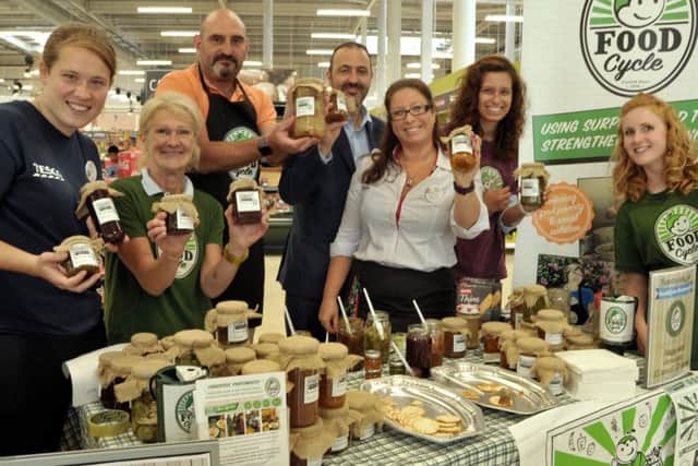 Pompey Preserves join with staff sell their products at Tesco Express, Fratton, to raise funds for FoodCycle Portsmouth Picture: Mick Young (161054-01)