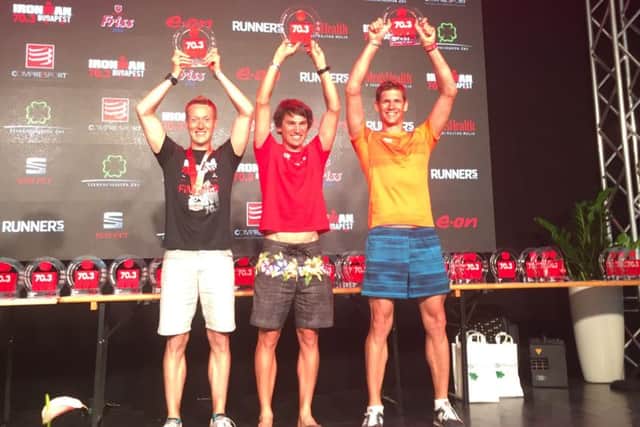 Rob Arkell, left, on the podium in Budapest