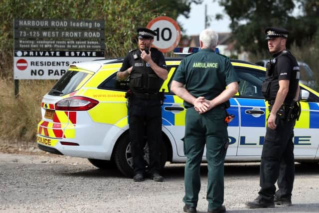 Police at the scene on Harbour Road, Pagham, West Sussex, where they are in a stand-off with a 72-year-old man who is thought to have a gun.
Picture : Andrew Matthews/PA Wire