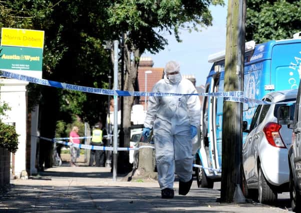 The scene in Outram Road, Southsea, where a man's body was found sparking a murder probe 

Picture: Sarah Standing (161247-2262)