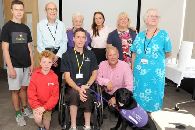 Mark Smith and, back row fourth left, marketing manager Hayley O'Connor from The Car Finance Company, with the Friends in Finance winners. Picture: Sarah Standing (161246-5713)