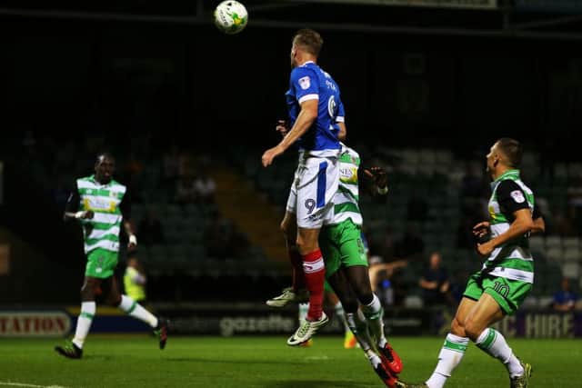 Michael Smith completes his hat-trick. Picture: Joe Pepler