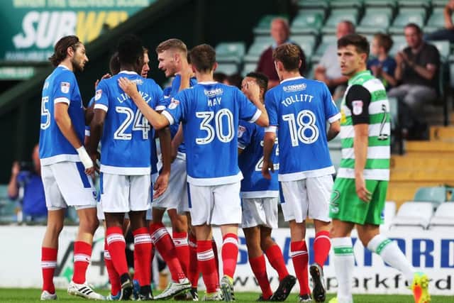 Michael Smith celebrates his opening goal. Picture: Joe Pepler