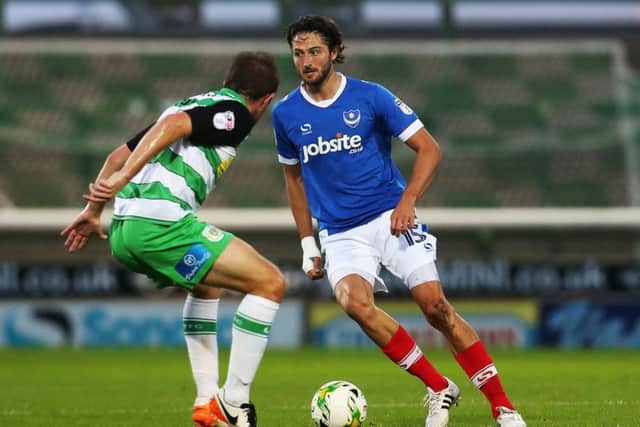Basher Benfield is not convinced by Adam Barton at centre-back. Picture: Joe Pepler