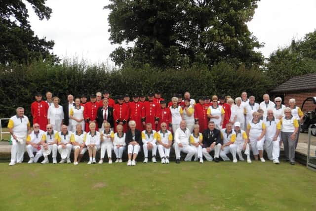 Members of Denmead Bowls Club with the Chelsea Pensioners' team
 Picture: Danny Randon