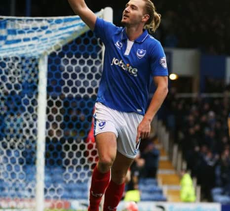 Adam McGurk sported a man-bun in his one-season Pompey stay    Picture: Joe Pepler