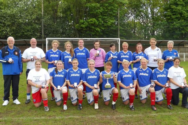 Dave Coyle, left, with Pompey Ladies 2012 title winners