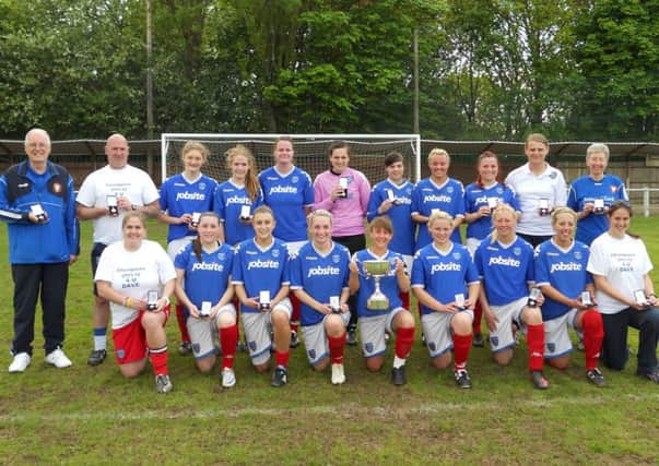 Dave Coyle, left, with Pompey Ladies 2012 title winners