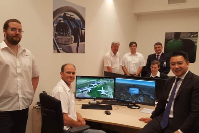 Havant MP Alan Mak with the team from Turbulent Designs