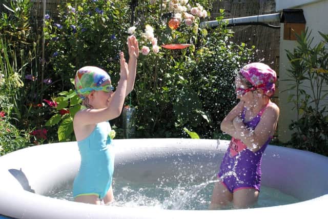 The second-placed picture, taken by Chrissy Williams of her six-year-old twin granddaughters in her spa having a splashing time