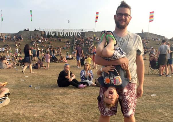 Kimberly Barrett's picture of her husband Tom and their five-year-old Jacob at Victorious Festival is the winner of The News One Summer's Day competition
