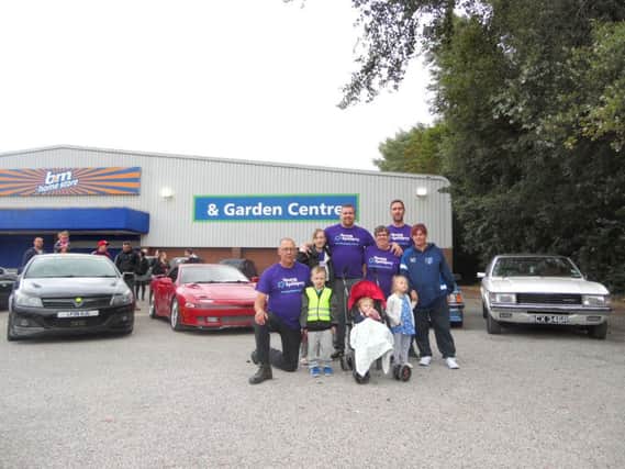 The Cannings family at the charity car meet, in Fareham, which raised money for young Epilepsy