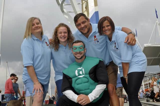 Supporters and family friends of Charlie Harris who has leukaemia get ready to abseil at The Spinnaker Tower to raise money for his charity. (left to right), Claire Henry, Carly Cooper, Mark and Nikki Knoll-Pollard with front Ian Arbuckle.
Picture Ian Hargreaves (161205-3)