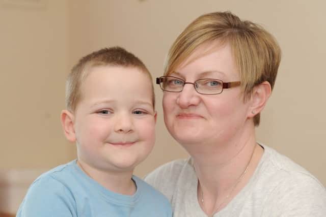 Charlie Harris (6) with his mum Marie Harris
Picture: Sarah Standing (160652-5363)