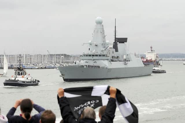 HMS Daring left Portsmouth on Friday  

Picture by:  Malcolm Wells (160902-9532)