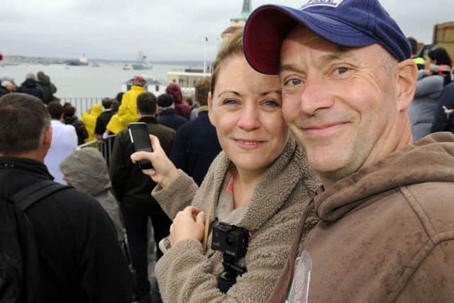 HMS DARING                                MRW                                                            2/9/2016HMS Daring left Portsmouth on Friday afternoon and despite the rain several hundred families and friends went to see them off from The Round Tower and the adjoining Hot Walls They came to see their daughter AB (Warfare) Ella Knight (21) sail on HMS Daring - Paul Rollins (47) and his wife Helen Rollins (43) from Harwich Essex Picture by:  Malcolm Wells (160902-4581)Professional Photographer Mobile: 07802 217 569E: malcolmrichardwells@gmail.com PPP-160209-161807006