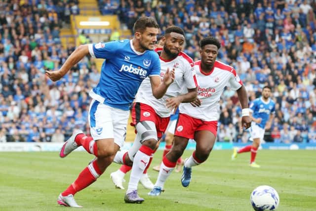 Gareth Evans goes on the attack for Pompey in today's 3-0 win over Crawley Town   Picture: Joe Pepler