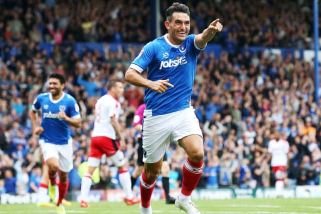 Gary Roberts celebrates his goal as Pompey crushed Crawley. Picture: Joe Pepler