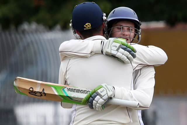 Ben Walker and Rob Gibson celebrate winning the Southern League. Picture: Innes Marlow (161239-1)