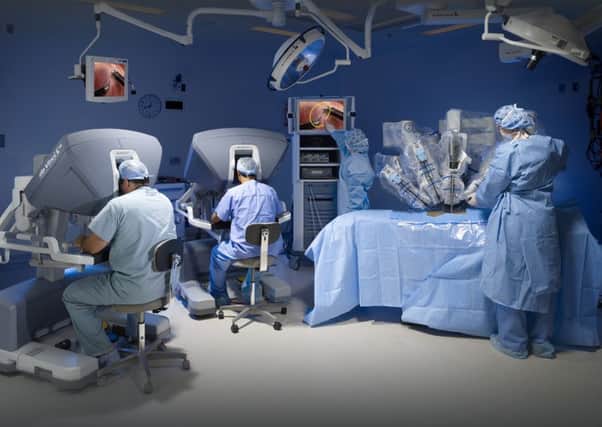 The Da Vinci robot in action Picture: Mark Clifford/Intuitive Surgical