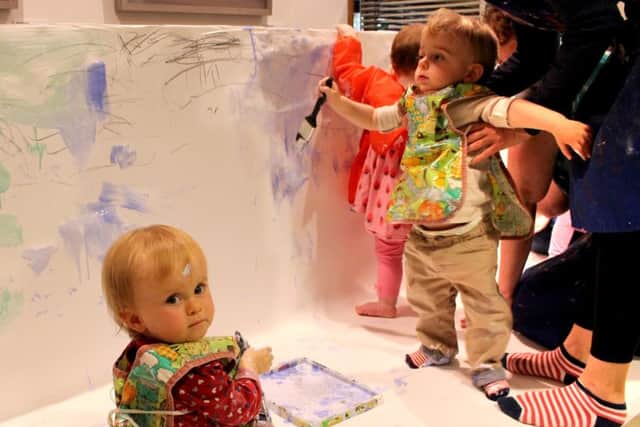 Children at the messy art workshop