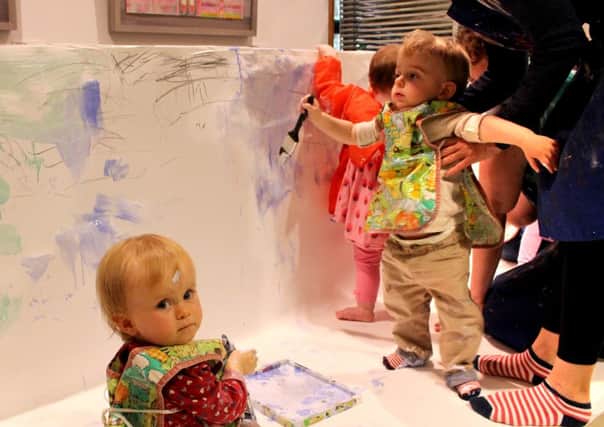 Children at the messy art workshop