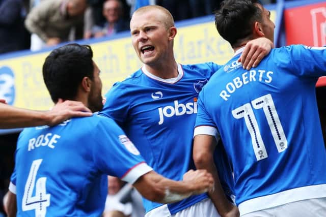 Curtis Main, centre, celebrated scoring against Crawley Picture: Joe Pepler