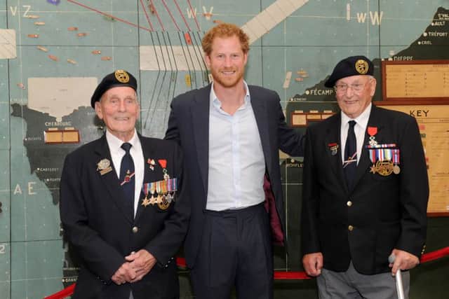 Prince Harry with John Dennett and Frank Diffell at Southwick House
Picture: Sarah Standing (160749-1415)