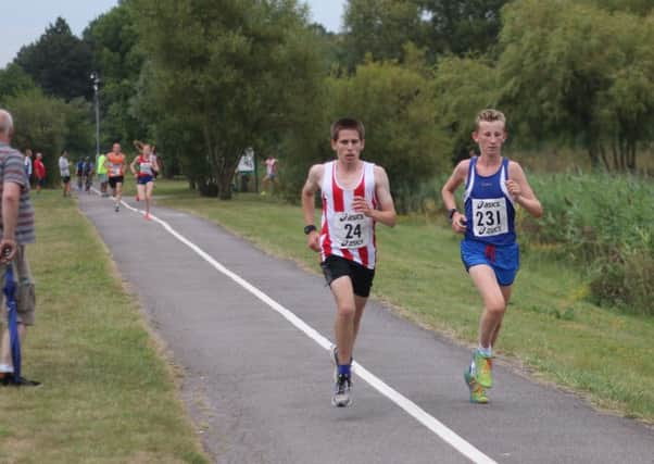Jacob O'Hara, right, in Lakeside 5k action recently. Picture: David Brawn