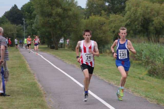 Jacob O'Hara, right, in Lakeside 5k action recently. Picture: David Brawn