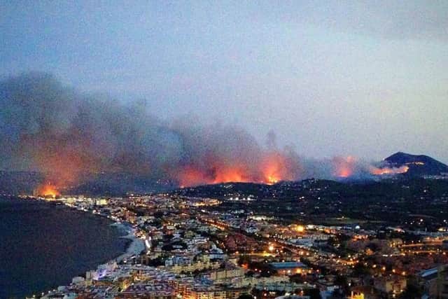 A wildfire raging in  Javea near Benidorm, Spain, that has forced the evacuation of around 2,000 people. Claire Edwards/PA Wire
