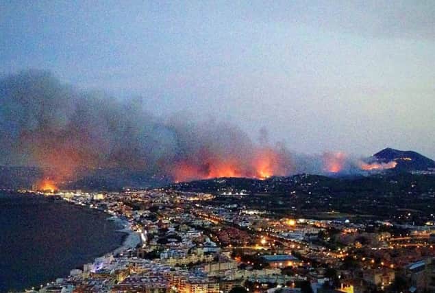 A wildfire raging in  Javea near Benidorm, Spain, that has forced the evacuation of around 2,000 people. Claire Edwards/PA Wire