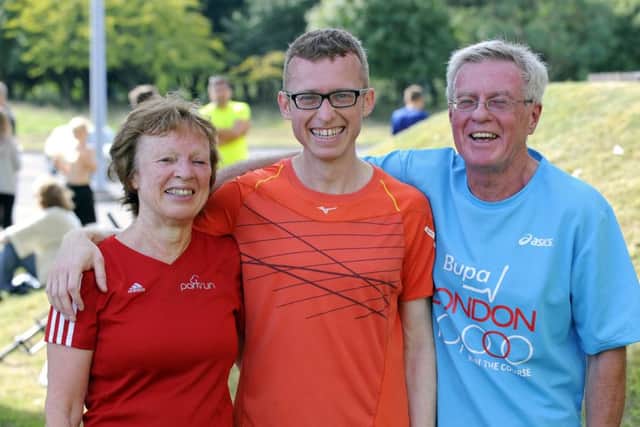 Pete Collins with mum Jane Collins and dad Mike Collins. Picture: Malcolm Wells (160813-5484)