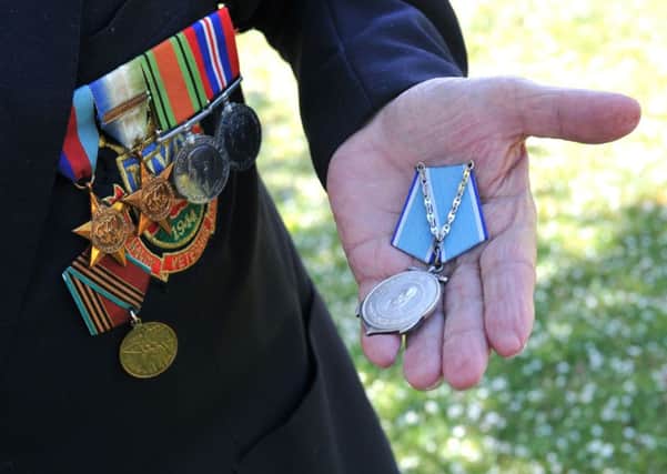 Wearing medals which have not been legitimately awarded could soon be an offence